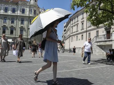 - 19.7.2022 - reportaža na temo vročina - dežnik //FOTO: Jaka Gasar