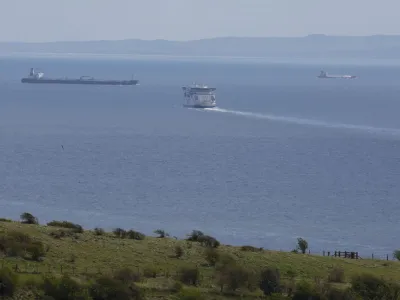 A cross-channel ferry sails towards northern France amid cargo ships, as viewed from the coastal port town of Dover, Britain, April 18, 2024. REUTERS/Toby Melville