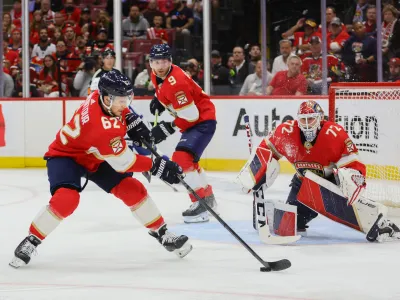 Apr 21, 2024; Sunrise, Florida, USA; Florida Panthers defenseman Brandon Montour (62) moves the puck against the Tampa Bay Lightning during the second period in game one of the first round of the 2024 Stanley Cup Playoffs at Amerant Bank Arena. Mandatory Credit: Sam Navarro-USA TODAY Sports