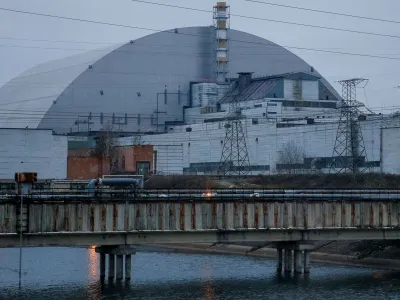 FILE PHOTO: A general view shows the New Safe Confinement (NSC) structure over the old sarcophagus covering the damaged fourth reactor at the Chernobyl Nuclear Power Plant in Chernobyl, Ukraine November 22, 2018. Picture taken November 22, 2018. REUTERS/Gleb Garanich/File Photo