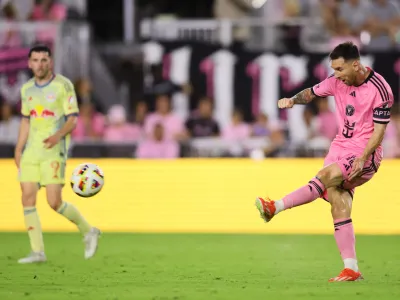 May 4, 2024; Fort Lauderdale, Florida, USA; Inter Miami CF forward Lionel Messi (10) passes during the second half against the New York Red Bulls at Chase Stadium. Mandatory Credit: Sam Navarro-USA TODAY Sports