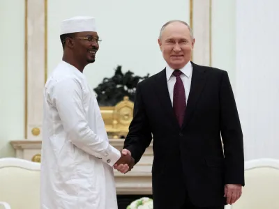 FILE PHOTO: Russia's President Vladimir Putin shakes hands with Chad's interim President Mahamat Idriss Deby during a meeting at the Kremlin in Moscow, Russia January 24, 2024. Sputnik/Mikhail Metzel/Pool via REUTERS ATTENTION EDITORS - THIS IMAGE WAS PROVIDED BY A THIRD PARTY./File Photo