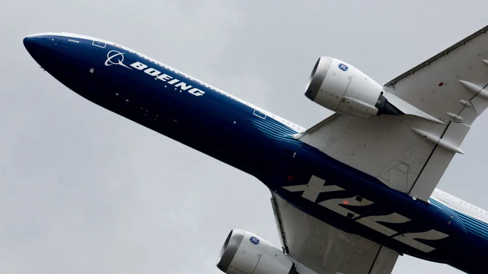 FILE PHOTO: A Boeing 777-9, a variant of the 777X, performs a flying display at the 54th International Paris Airshow at Le Bourget Airport near Paris, France, June 20, 2023. REUTERS/Benoit Tessier/File Photo