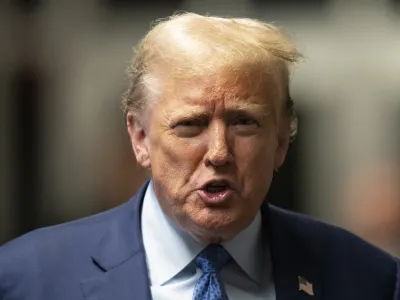 Republican presidential candidate, former President Donald Trump speaks to the media outside his trial at Manhattan criminal court Thursday, May 9, 2024, in New York. (Steven Hirsch/New York Post via AP, Pool)