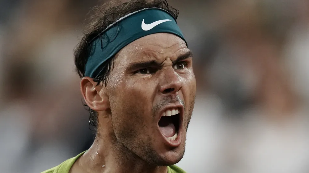 FILE -Spain's Rafael Nadal celebrates winning the first set against Germany's Alexander Zverev during their semifinal match at the French Open tennis tournament in Roland Garros stadium in Paris, France, Friday, June 3, 2022. Rafael Nadal is in the French Open field, after all, and the 14-time champion was set up for a challenging first-round matchup in Thursday's, May 23, 2024, draw against Alexander Zverev. (AP Photo/Thibault Camus, File)