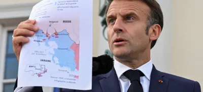 French President Emmanuel Macron speaks to reporters on the day of a joint Franco-German cabinet meeting at the German government's guest house, Schloss Meseberg castle north of Berlin, in Gransee, Germany, May 28, 2024. REUTERS/Annegret Hilse