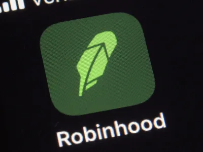 FILE - This Dec. 17, 2020, photo shows the logo for the Robinhood app on a smartphone in New York. Robinhood, the online brokerage that found itself embroiled in this year's meme stock phenomenon, will seek to go public with a market valuation of up to  billion. The company said in a regulatory filing on Monday, July 19, 2021, that it wanted to price the 55 million shares in its initial public offering in a range of  to  per share. It could raise approximately .3 billion if shares are sold at the high end of the range. (AP Photo/Patrick Sison, File)