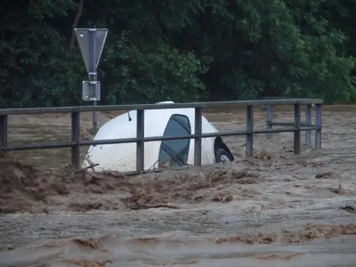 09 June 2024, Austria, Sch&auml;ffern: A car submerged in water as torrential rainfall once again caused numerous floods early 09 June in Austria. Photo: Einsatzdoku.At Patrik Lechner/APA/dpa