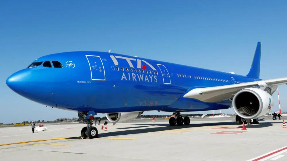 FILE PHOTO: A new Italia Trasporto Aereo (ITA) plane with the state airline's blue livery is seen at Fiumicino airport before a news conference to present the new fleet, in Rome, Italy, March 1, 2022. REUTERS/Remo Casilli/File Photo