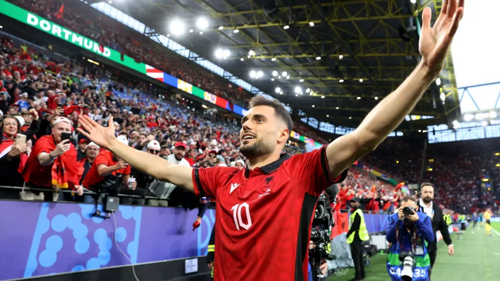 Soccer Football - Euro 2024 - Group B - Italy v Albania - Dortmund BVB Stadion, Dortmund, Germany - June 15, 2024 Albania's Nedim Bajrami celebrates scoring their first goal REUTERS/Bernadett Szabo