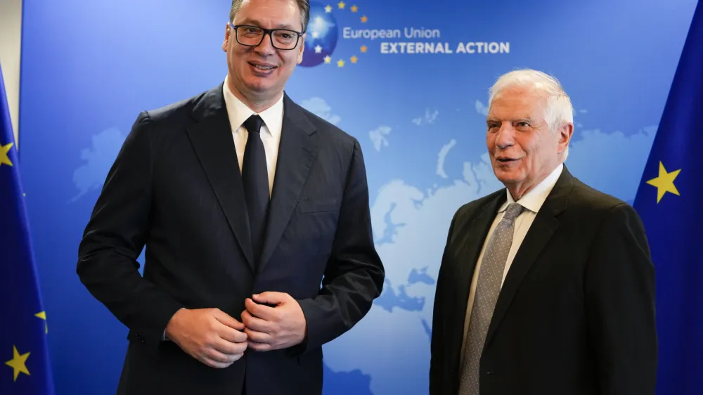 European Union foreign policy chief Josep Borrell, right, poses with Serbia's President Aleksander Vucic prior to talks on Serbia-Kosovo in Brussels, Wednesday, June 26, 2024. (AP Photo/Virginia Mayo)