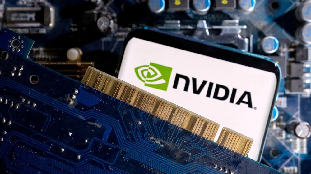 FILE PHOTO: A smartphone with a displayed NVIDIA logo is placed on a computer motherboard in this illustration taken March 6, 2023. REUTERS/Dado Ruvic/Illustration/File Photo/File Photo