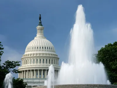 FILE PHOTO: The dome of the U.S. Capitol is seen beyond a fountain in Washington, U.S., August 12, 2022. REUTERS/Kevin Lamarque/File Photo