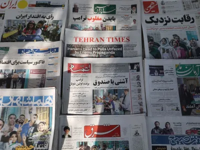 Newspapers with a cover picture of Iran's presidential election are seen in Tehran, Iran June 29, 2024. Majid Asgaripour/WANA (West Asia News Agency) via REUTERS ATTENTION EDITORS - THIS PICTURE WAS PROVIDED BY A THIRD PARTY.