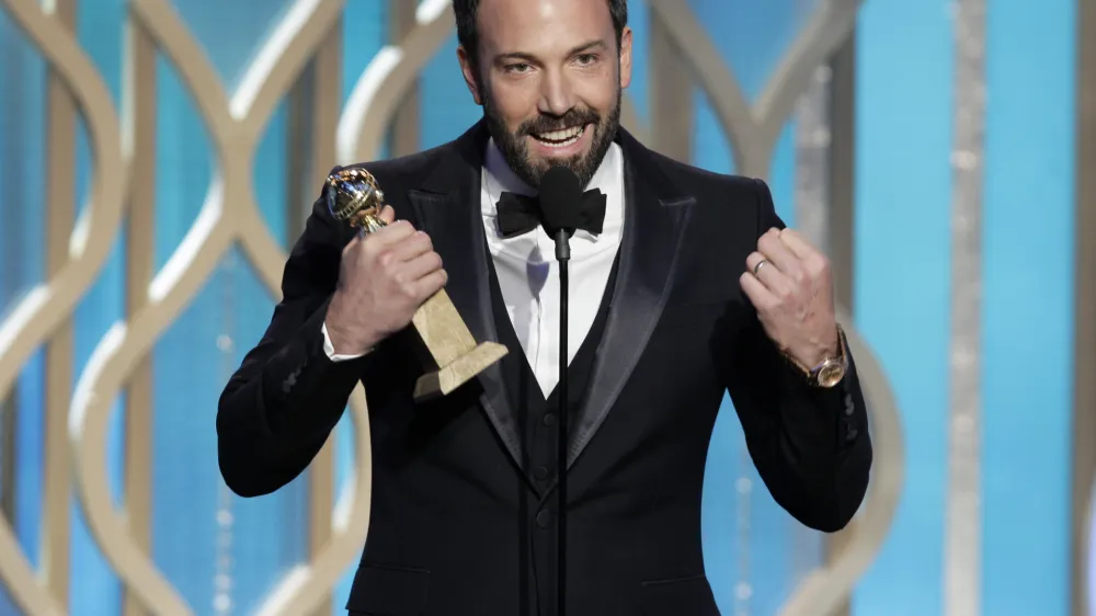This image released by NBC shows Ben Affleck with his award for best director for "Argo" during the 70th Annual Golden Globe Awards at the Beverly Hilton Hotel on Jan. 13, 2013, in Beverly Hills, Calif. (AP Photo/NBC, Paul Drinkwater)