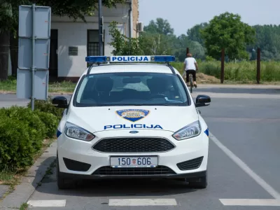 Picture of a Ford car from the Croatian police forces, also known as Hrvatska Policija or MUP, in the street of Vukovar