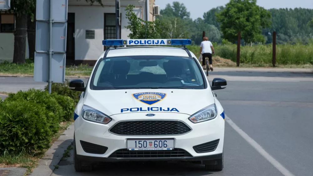 Picture of a Ford car from the Croatian police forces, also known as Hrvatska Policija or MUP, in the street of Vukovar