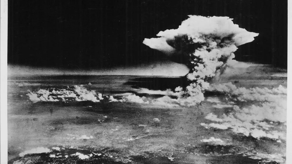 An atomic cloud billows above Hiroshima city following the explosion of the first atomic bomb to be used in warfare in Hiroshima, in this handout photo taken by the U.S. Army on August 6, 1945, and distributed by the Hiroshima Peace Memorial Museum. The words written on the photo are from the source. Mandatory credit REUTERS/U.S. Army/Hiroshima Peace Memorial Museum/Handout via Reuters TPX IMAGES OF THE DAYATTENTION EDITORS - THIS PICTURE WAS PROVIDED BY A THIRD PARTY. REUTERS IS UNABLE TO INDEPENDENTLY VERIFY THE AUTHENTICITY, CONTENT, LOCATION OR DATE OF THIS IMAGE. NO SALES. NO ARCHIVES. FOR EDITORIAL USE ONLY. NOT FOR SALE FOR MARKETING OR ADVERTISING CAMPAIGNS. MANDATORY CREDIT. THIS PICTURE IS DISTRIBUTED EXACTLY AS RECEIVED BY REUTERS, AS A SERVICE TO CLIENTS.