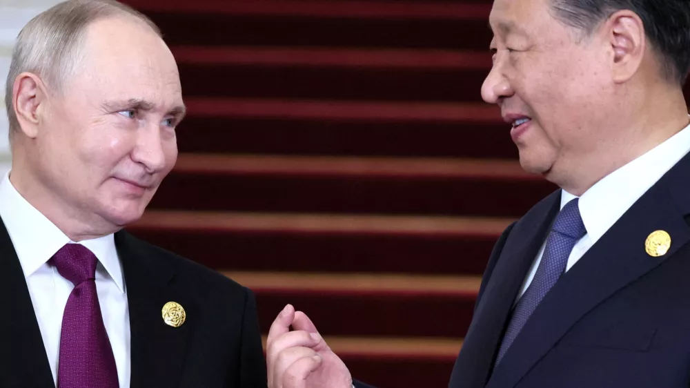 FILE PHOTO: Russian President Vladimir Putin speaks with Chinese&nbsp;President&nbsp;Xi Jinping during a welcoming ceremony at the Belt and Road Forum in Beijing, China, October 17, 2023. Sputnik/Sergei Savostyanov/Pool via REUTERS ATTENTION EDITORS - THIS IMAGE WAS PROVIDED BY A THIRD PARTY./File Photo