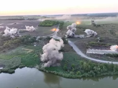 A drone view shows what the 68th Separate Jaeger Brigade 'Oleksy Dovbusha' says are multiple launch rocket system strikes on Russian troops, in Novozhelanne, Donetsk Region, Ukraine, in this still image from handout video obtained on August 21, 2024.  Reuters TV/68TH SEPARATE JAEGER BRIGADE 'OLEKSY DOVBUSHA'/Handout via REUTERS  THIS IMAGE HAS BEEN SUPPLIED BY A THIRD PARTY. MANDATORY CREDIT. NO RESALES. NO ARCHIVES. MUST NOT OBSCURE LOGO