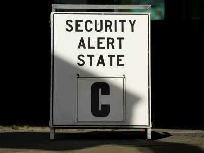A sign is displayed at the main gate after NATO air base in the German town of Geilenkirchen has raised its security level "based on intelligence information indicating a potential threat," in Geilenkirchen, Germany August 23, 2024. REUTERS/Thilo Schmuelgen