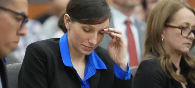 Kouri Richins, a Utah mother of three who wrote a children's book about coping with grief after her husband's death and was later accused of fatally poisoning him, looks on during a hearing Tuesday, Aug. 27, 2024, in Park City, Utah. (AP Photo/Rick Bowmer, Pool)