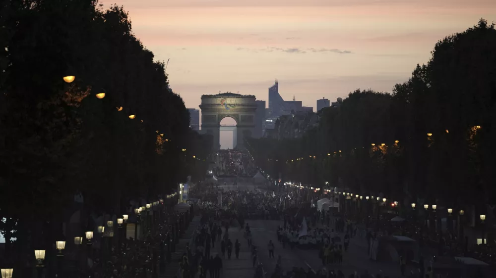 Delegations arrive to the Opening Ceremony for the 2024 Paralympics, Thursday, Aug. 29, 2024, in Paris, France. (AP Photo/Aurelien Morissard)