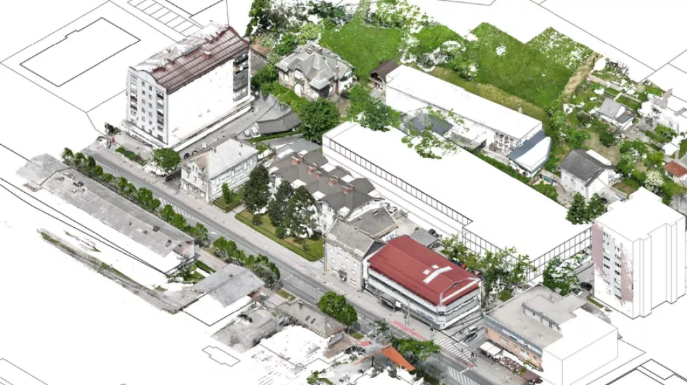 Garažno hi&scaron;o bi občina zgradila za stavbo, kjer deluje banka in je zdaj makadamsko parkiri&scaron;če. Foto:&nbsp;&nbsp;Občina Jesenice