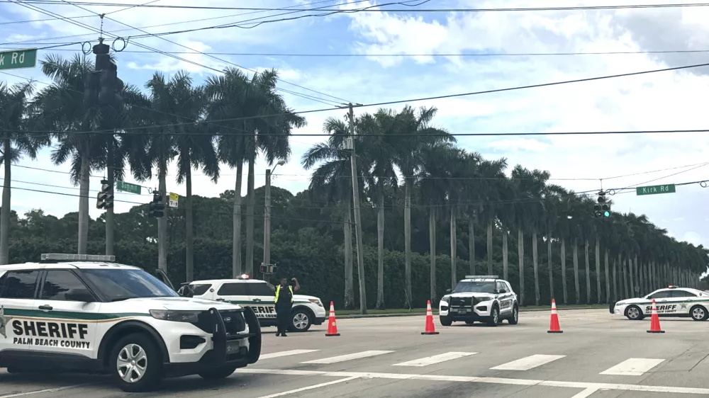 Sheriff vehicles are pictured near Trump International Golf Club, Sunday. Sept. 15, 2024, in West Palm Beach, Fla., after gunshots were reported in the vicinity of Republican presidential candidate former President Donald Trump. (AP Photo/Stephanie Matat)