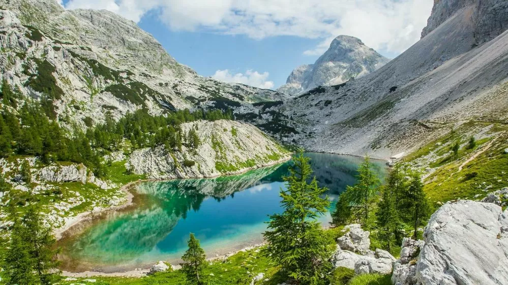 &Scaron;tevilna praznovanja ob 100-letnici zavarovanja Doline Triglavskih jezer.  F TNP