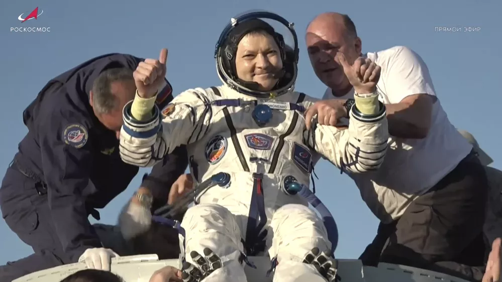 In this photo taken from video released by Roscosmos space corporation, rescue team members help Roscosmos cosmonaut Oleg Kononenko to leave the capsule shortly after the landing of the Russian Soyuz MS-25 space capsule carrying the NASA astronaut Tracy Dyson and the Roscosmos cosmonauts Oleg Kononenko and Nikolai Chub, south-east of the Kazakh town of Zhezkazgan, Kazakhstan, Monday, Sept. 23, 2024. (Roscosmos space corporation via AP)