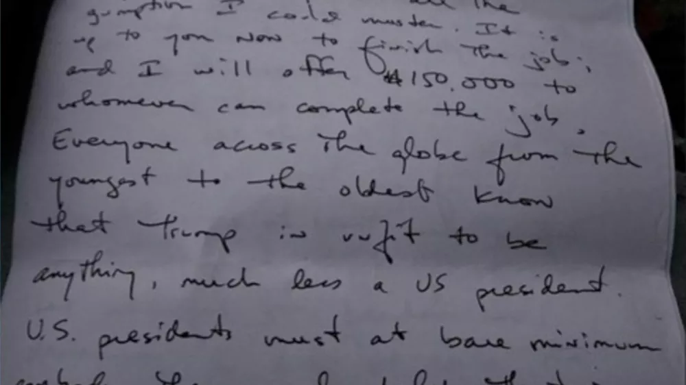 Picture of the first page of the handwritten letter said to be by Ryan Routh, the man who authorities allege carried out an apparent attempted assassination on Republican presidential nominee and former U.S. President Donald Trump taken by the witness addressed to "The World," stated, among other things, "This was an assassination attempt on Donald Trump but I failed you. I tried my best and gave it all the gumption I could muster. It is up to you now to finish the job, and I will offer $150,000 to whomever can complete the job." in this undated Handout image. United States District Court Southern District Of Florida/Handout via REUTERS  THIS IMAGE HAS BEEN SUPPLIED BY A THIRD PARTY. BEST QUALITY AVAILABLE
