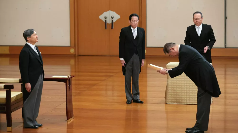 Japan's Emperor Naruhito stands as new Prime Minister Shigeru Ishiba bows deeply while former prime minister Fumio Kishida looks on, during Ishiba's attestation ceremony at the Imperial Palace in Tokyo, Japan October 1, 2024, in this photo released by Kyodo. Mandatory credit Kyodo/via REUTERS ATTENTION EDITORS - THIS IMAGE WAS PROVIDED BY A THIRD PARTY. MANDATORY CREDIT. JAPAN OUT. NO COMMERCIAL OR EDITORIAL SALES IN JAPAN.