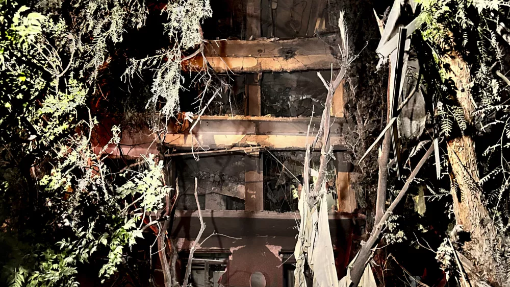 A building damaged by an Israeli strike in a residential building in Damascus, Syria, Tuesday, Oct. 8, 2024. (AP Photo/Omar Sanadiki)