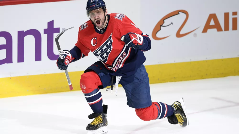 Washington Capitals left wing Alex Ovechkin celebrates his goal during the second period of the team's NHL hockey game against the New York Islanders, Tuesday, March 16, 2021, in Washington. This was Ovechkin's 718th career NHL goal, moving him to sixth on the career list. (AP Photo/Nick Wass)
