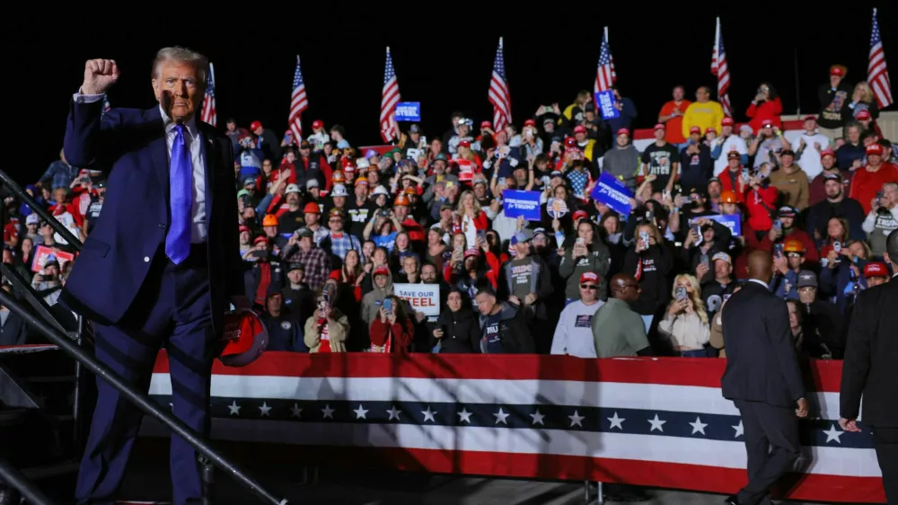 Republican presidential nominee and former U.S. President Donald Trump gestures at the end of his Make America Great Again Rally in Latrobe, Pennsylvania, U.S. October 19, 2024. REUTERS/Brian Snyder