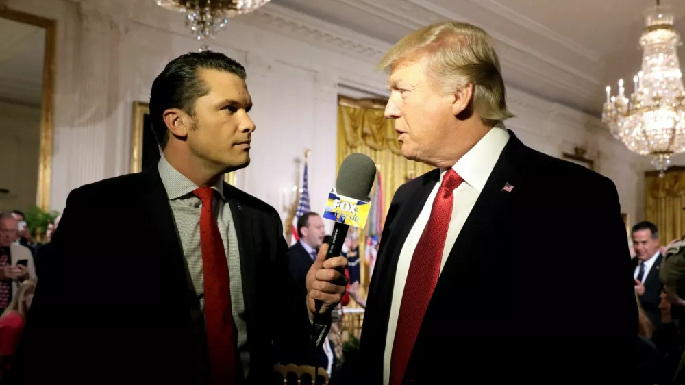 FILE PHOTO: U.S. President Donald Trump is interviewed by Fox and Friends co-host Pete Hegseth at the White House in Washington, U.S. April 6, 2017. REUTERS/Kevin Lamarque/File Photo