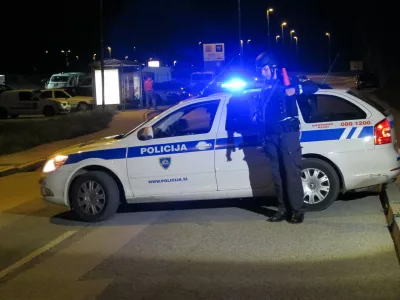 Nočni oboroženi rop varnostnikov Sintala, LAbore, Kranj, oborožen policist