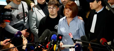 Frenchwoman Gisele Pelicot, the victim of an alleged mass rape orchestrated by her then-husband Dominique Pelicot at their home in the southern French town of Mazan, talks to journalists after the verdict in the trial for Dominique Pelicot and 50 co-accused, at the courthouse in Avignon, France, December 19, 2024. REUTERS/Manon Cruz