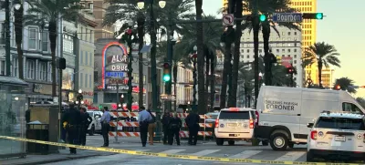 An Orleans Parish coroner's van is parked at the corner of Bourbon and Canal streets after a pickup truck was driven into a large crowd in the French Quarter of New Orleans, Louisiana, U.S. January 1, 2025. Marc Weiszer/USA TODAY NETWORK via REUTERS   NO RESALES. NO ARCHIVES. MANDATORY CREDIT