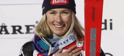 The winner United States' Mikaela Shiffrin celebrates after an alpine ski, women's World Cup slalom, in Are, Sweden, Sunday, March 10, 2024. (AP Photo/Alessandro Trovati)