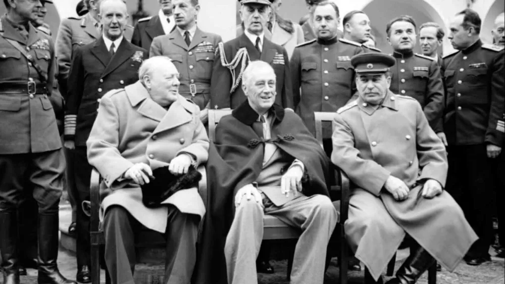 'The Big Three': Winston Churchill, Franklin D Roosevelt and Joseph Stalin sit for photographs during the Yalta Conference in February 1945.NAM 236Part ofWAR OFFICE SECOND WORLD WAR OFFICIAL COLLECTION
