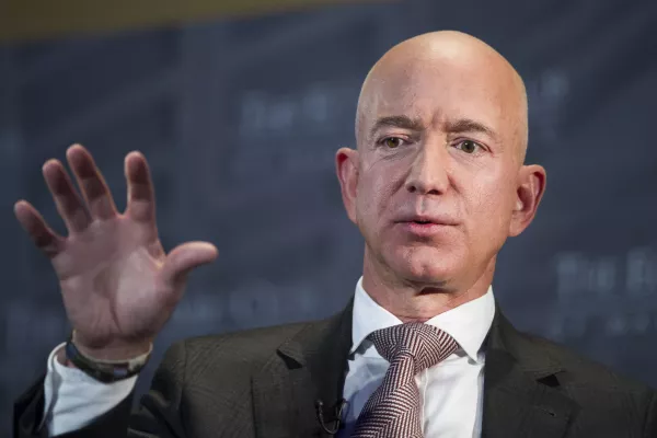 FILE - In this Sept. 13, 2018, file photo, Jeff Bezos, Amazon founder and CEO, speaks at The Economic Club in Washington. Federal prosecutors in New York are planning to meet with Bezos about his allegations that the National Enquirer tried to blackmail him with help from Saudi Arabia. (AP Photo/Cliff Owen, File)