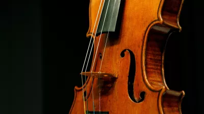 FILE PHOTO: A Stradivarius violin known as "The Penny" is displayed at Christie's auction house in New York March 27, 2008. REUTERS/Brendan McDermid (UNITED STATES)/File Photo