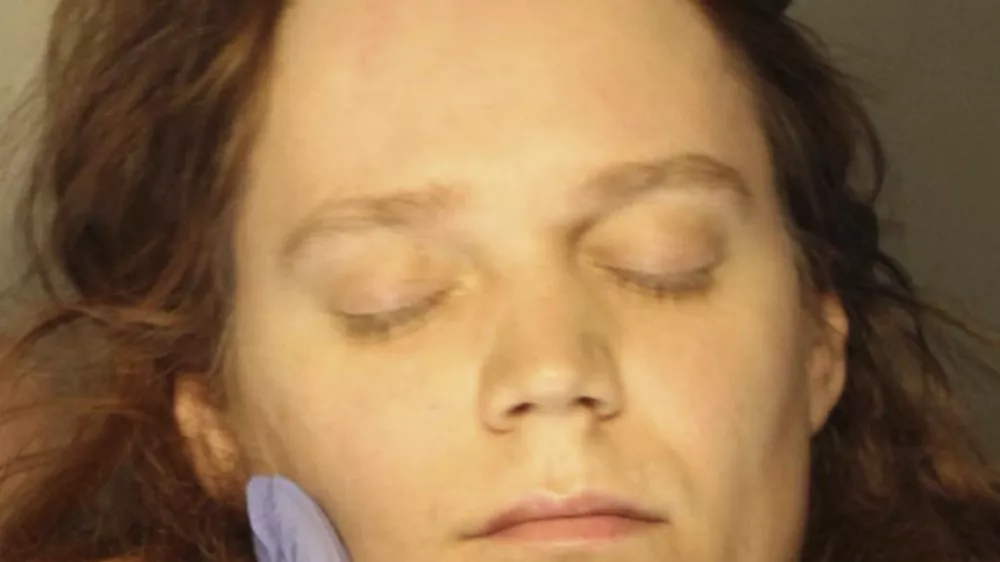 FILE - In this Jan., 2023 booking photo provided by the Delaware County, Pennsylvania, District Attorney's Office, Jack LaSota refused to speak and kept her eyes closed while being photographed after being detained in a hotel in suburban Pennsylvania on Jan. 23, 2023. (Delaware County, Pennsylvania, District Attorney's Office via AP, file)