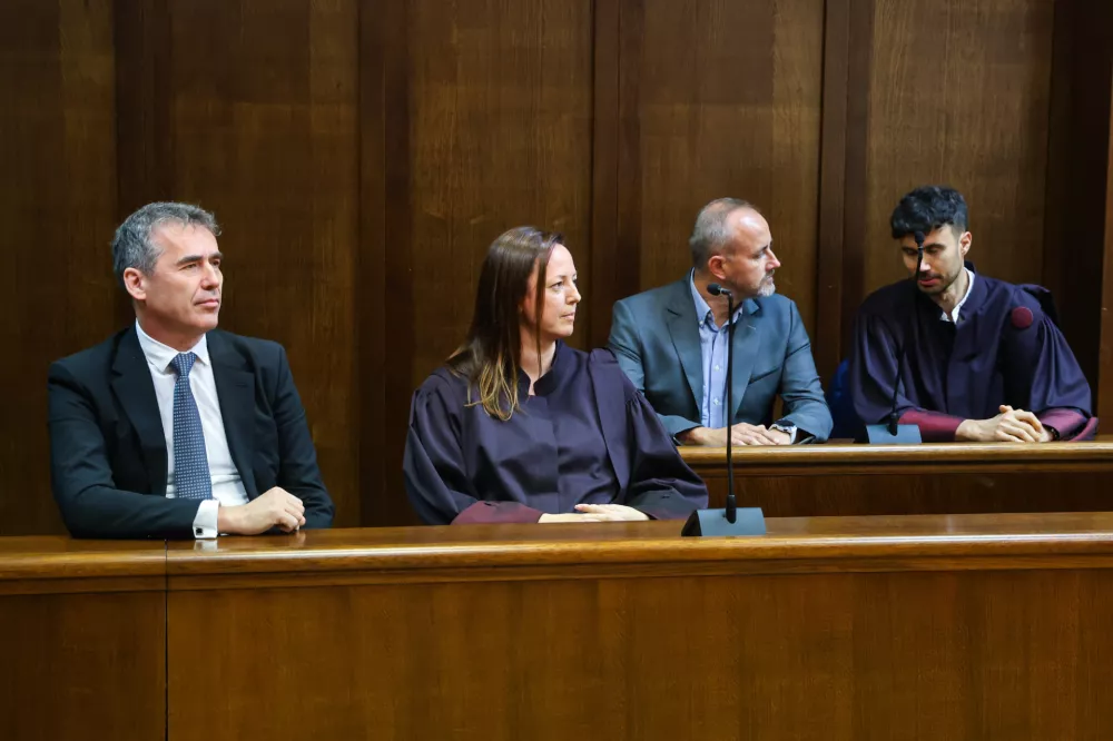 Sergej Racman (levo ob izreku sodbe v zadevi Marina) je eden bolj znanih slovenskih ubežnikov. / Foto: Tomaž Primožic/fpa