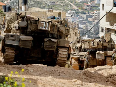 Israeli soldiers take part in an operation in Jenin, in the Israeli-occupied West Bank, February 24, 2025. REUTERS/Raneen Sawafta