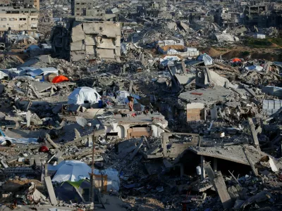 Tents are seen among the rubble of destroyed buildings, amid a ceasefire between Israel and Hamas, at Jabalia refugee camp, northern Gaza Strip, February 26, 2025. REUTERS/Mahmoud Issa