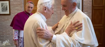 FILE - Pope Francis, right, hugs Pope Emeritus Benedict XVI in the former Convent Mater Ecclesiae at the Vatican, on Nov. 19, 2016. Pope Benedict XVI's 2013 resignation sparked calls for rules and regulations for future retired popes to avoid the kind of confusion that ensued. Benedict, the German theologian who will be remembered as the first pope in 600 years to resign, has died, the Vatican announced Saturday Dec. 31, 2022. He was 95. (L'Osservatore Romano/Pool Photo via AP, File)