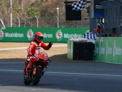 MotoGP - Thailand Grand Prix - Chang International Circuit, Buriram, Thailand - March 1, 2025 Ducati Lenovo Team's Marc Marquez celebrates after winning the MotoGP sprint REUTERS/Athit Perawongmetha